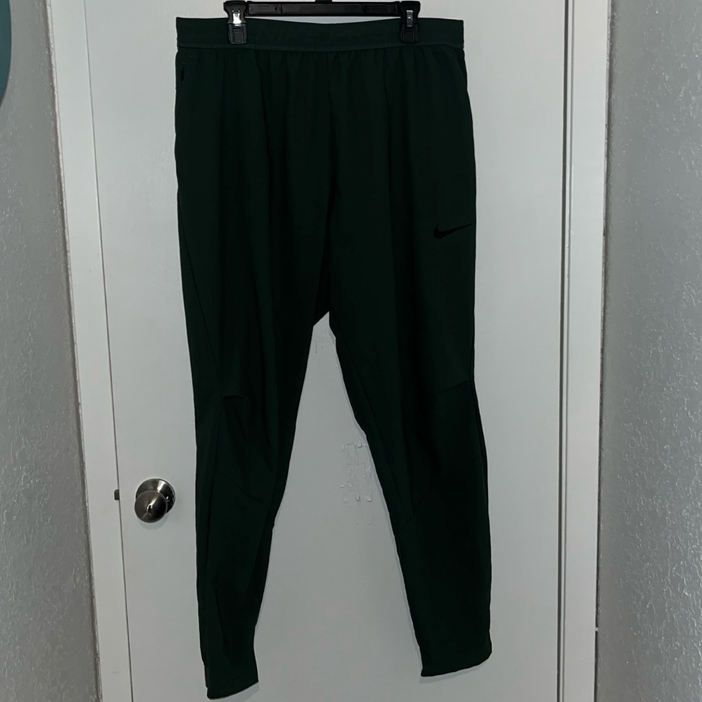 In good condition Kelly Green Nike Pro Joggers